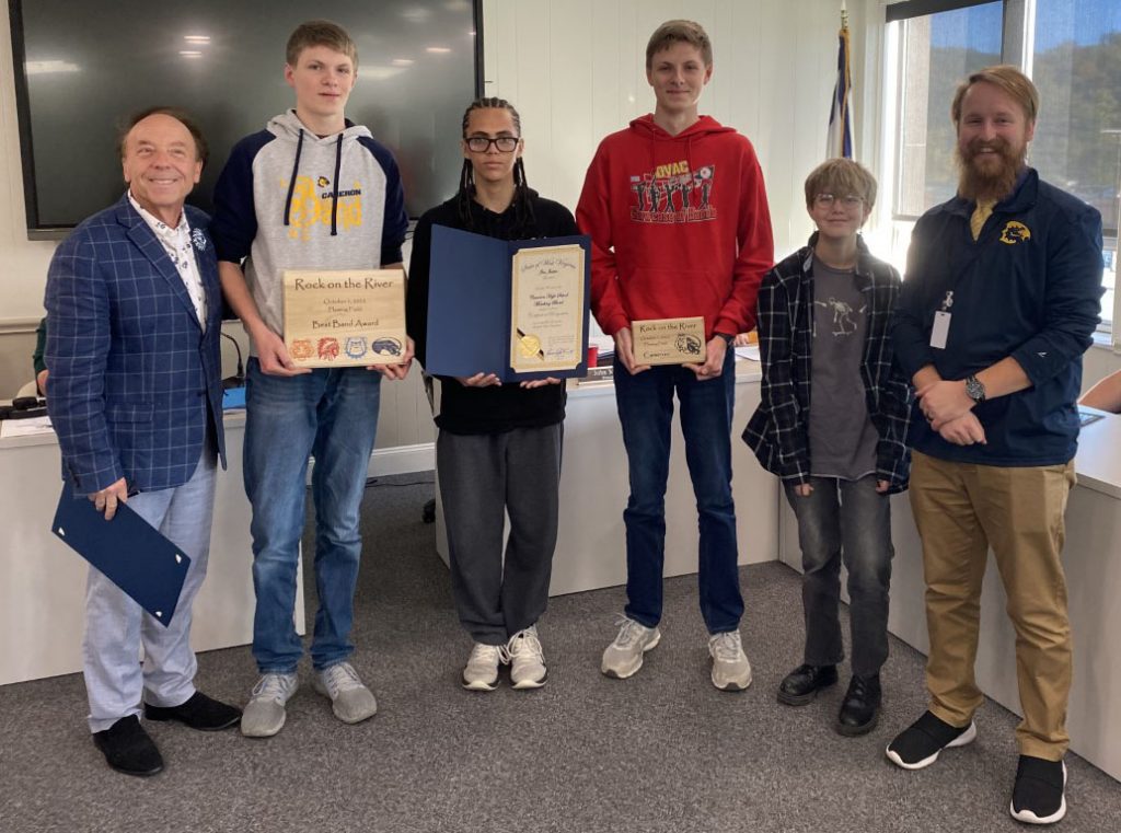 Pictured from left: Curator Randall Reid Smith, Joshua Meneely, Angel Rodriguez, Jacob Meneely, Dakota Suarez and CHS Band Director Christian Oliver. 